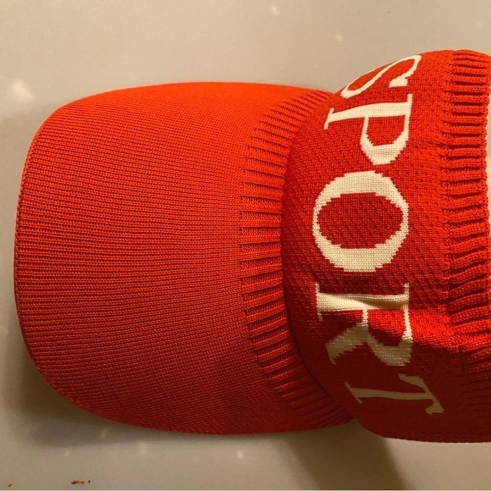 Red and White Textured Hat with Bold Lettering
